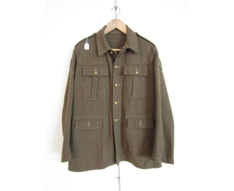 A reproduction First World War King's Liverpool Regiment other rank's Service Dress tunic