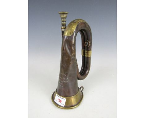 An early 20th Century Hawkes & Son copper bugle