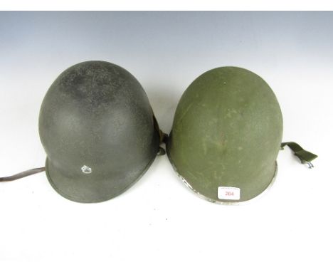 Two WWII US Army 'front seam' M1 helmets