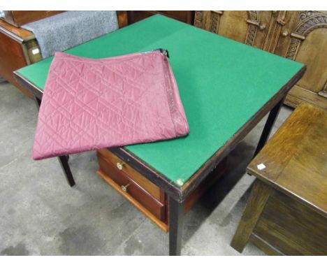 A large vintage folding cards table