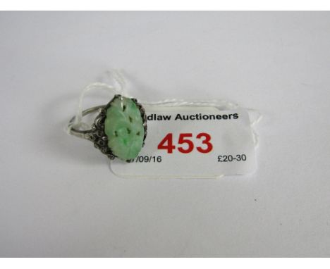 A 1930s silver mounted jade ring 