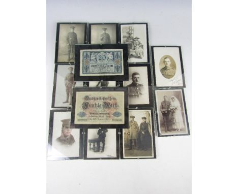 A quantity of First World War military portrait photographic postcards and two German bank notes