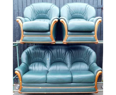 A green leather sofa suite, comprising three seater sofa and two matching arm chairs, the sofa, 110cm high, 191cm wide, 67cm 