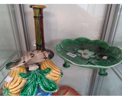 Maiolica bird and gourd decorated wall pocket, Majolica tazza and a candlestick
