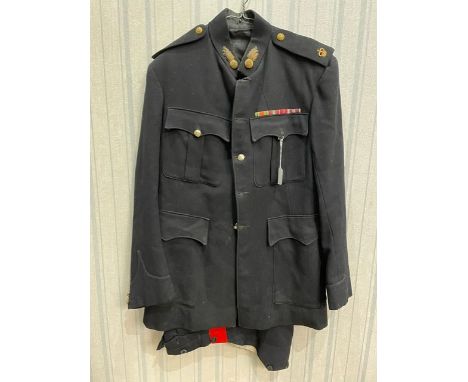 Royal Artillery Formal Uniform comprising longline jacket with brass buttons, and trousers with red stripe to side.