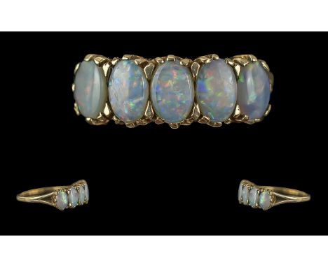 Ladies Attractive 9ct Gold Five Stone Opal Set Ring with raised openwork setting, full hallmark, the five, well matched opals