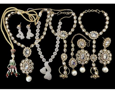 Collection of Decorative 'Bollywood' Style Jewellery, comprising stone set earrings, ring and bracelet combinations and penda
