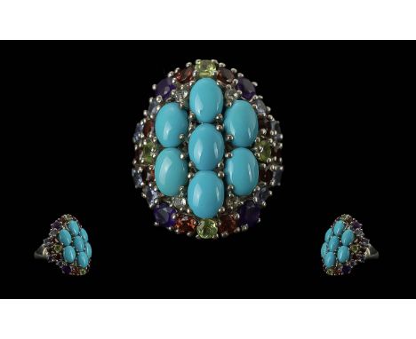 Turquoise and Multi Gemstone Statement Ring, seven oval cut turquoise, in a 2-3-2 formation, framed by round cut amethysts, p