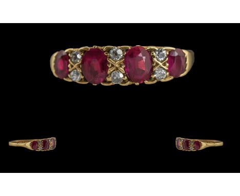 Ladies Fine 18ct Gold Ruby and Diamond Set Ring, Excellent Design / Setting. Marked 18ct to Interior of Shank. The Faceted Ru