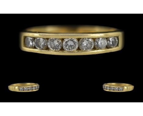 Ladies 18ct Gold - Pleasing Seven Stone Diamond Channel Set Ring, Full Hallmark to Interior of Shank. The Seven Brilliant Cut
