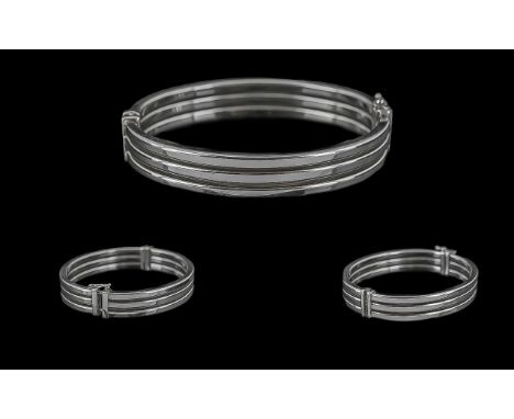 Ladies - Pleasing Quality and Stylish 9ct White Gold Hinged Bangle with Excellent Concealed Features, Marked 9.375. Weight 14