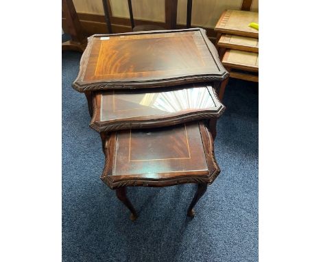 Nest of Three Tables, largest measures 21'' wide x 16'' deep x 22'' high.  Together with an oval occasional table with stretc