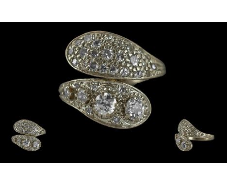 Ladies - Pleasing Quality 18ct White Gold Double Snake Head Diamond Set Ring, Not Marked but Tests 18ct Gold. The Diamond Set