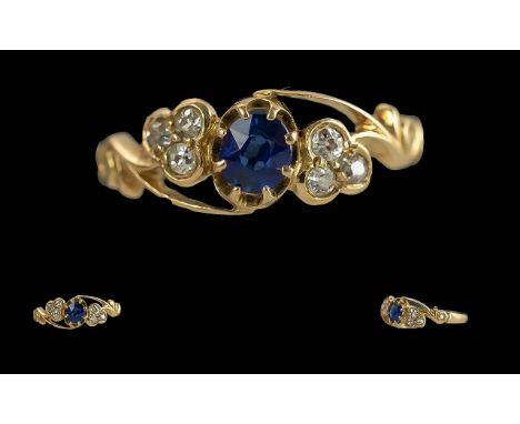 Ladies 18ct Gold Attractive Sapphire and Diamond Set Ring, Full Hallmark to Interior of Shank. The Central Blue Sapphire Flan