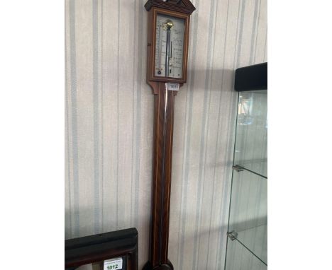 Edwardian Style Stick Barometer, made by Russell of Norwich, string inlay.  Measures 38'' length.