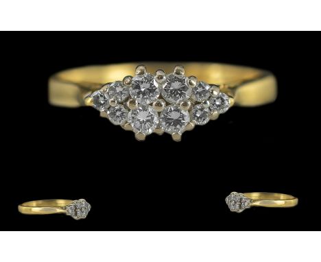 Ladies Attractive and Petite 18ct Gold Diamond Set Ring, full hallmark to interior of shank, the well matched small diamonds 