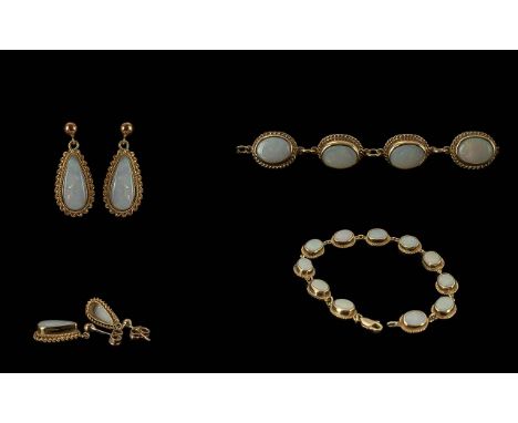 9ct Gold & Opal Bracelet with matching earrings, the bracelet formed of eleven oval Opals in gold mounts, together with a pai