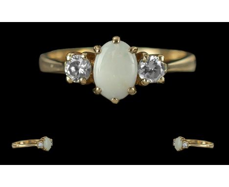 Ladies - Attractive 9ct Gold 3 Stone Diamond and Opal Ring, Full Hallmark to Interior of Shank. The Central Opal Flanked by T