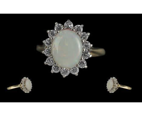 Ladies 9ct Gold Diamond and Opal Set Cluster Ring, Flower head Setting. Full Hallmark to Interior of Shank, The Central Opal 