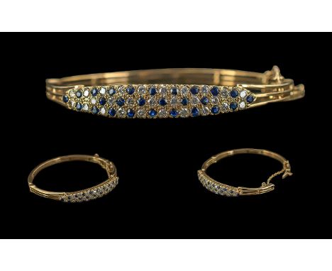Ladies 14ct Gold Diamond and Sapphire Set Hinged Bangle with Safety Chain, Pleasing Design. Full Hallmark to Interior of Bang
