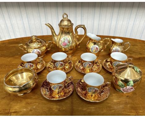 Vintage Gilt Tea Set, comprising six cups and saucers, teapot, milk jug and creamer, lidded sugar bowl, lidded preserve pot a