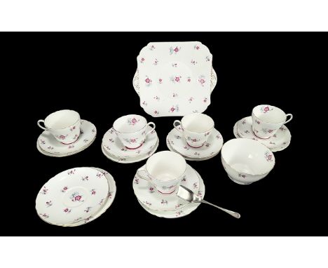 Shelley 'Charm' Pattern No. 13752 part tea set, comprising five cups, six saucers, six side plates, sugar bowl and bread and 