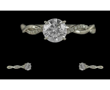 Ladies Superb 18ct White Gold Contemporary Single Stone Diamond Set Ring with diamond shoulders, full hallmark to interior of