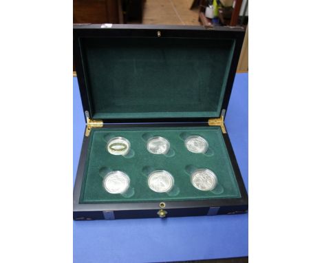 A cased New Zealand silver proof The Lord of The Rings six coin set, with insert.