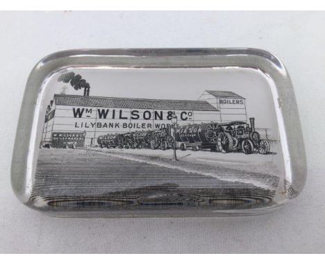 A William Wilson Boilers advertising paperweight depicting a traction engine.