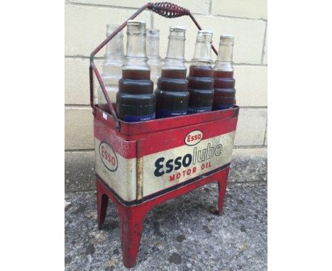 An Essolube Motor Oil eight bottle crate containing eight Esso bottles.