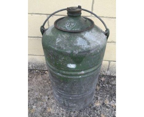 A cylindrical BP fuel can with swing handle. 