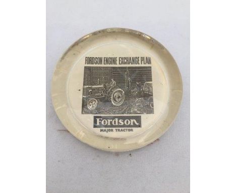 A Fordson Major Tractor glass paperweight. 