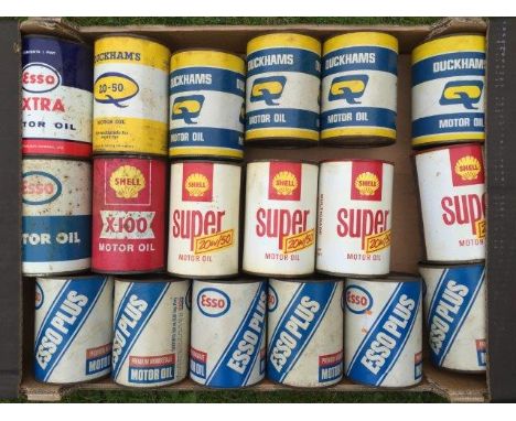 A collection of 1970s Duckham's, Shell and Esso oil canisters. 