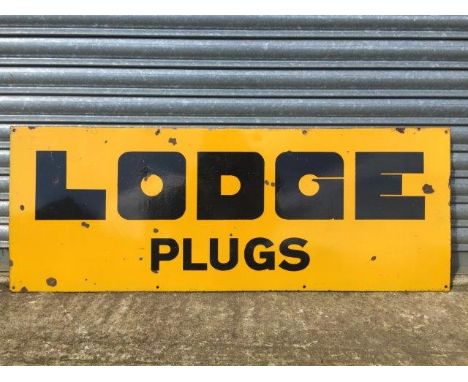 A Lodge Plugs rectangular enamel sign, 48 x 18".