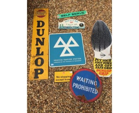 A selection of signage to include a narrow Dunlop aluminium advertising sign, a double sided circular enamel sign - Waiting P