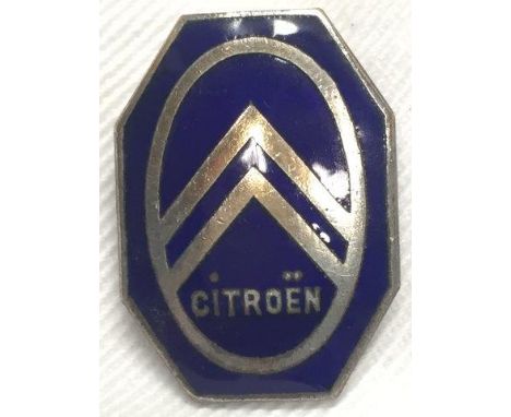 A Citroen blue enamel lapel badge.