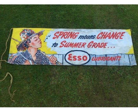 A rare 1950s Esso banner - Spring Means Change to Summer Grade, 100 x 33".