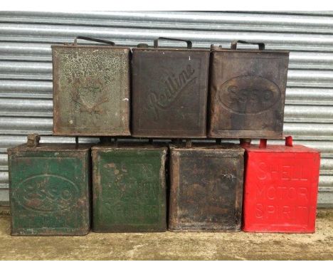 An assortment of two gallon petrol cans to include Redline.