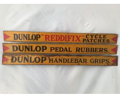 Three Dunlop shelf strips advertising 'Reddifix' Cycle Patches, Pedal Rubbers and Handlebar Grips.