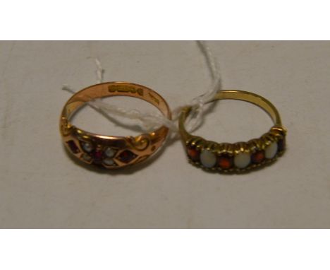 A lady's garnet and seed pearl ring, 9ct gold shank;  another, a 9ct gold seven stone, opal and garnet (2)