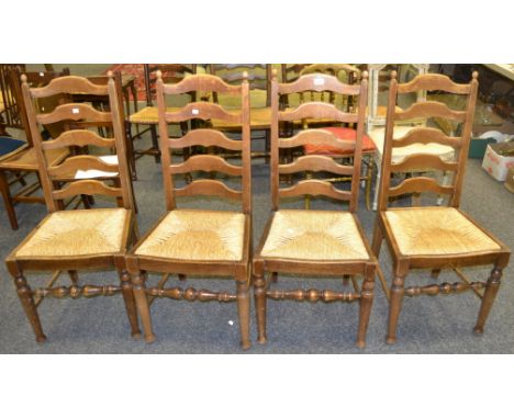 A set of four ladder back chairs, rush seats (4)