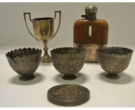 A silver two-handled trophy;  three Indian silver bowls;  an EPNS and leather hip flask;   etc 