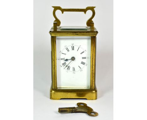 A gilt brass carriage clock, 15cm.