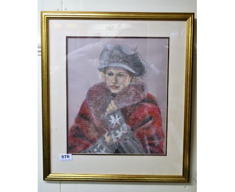 A gilt framed pastel portrait of a young woman, 45 x 52cm.