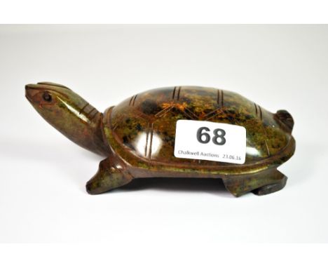 A Chinese carved jade tortoise, L. 15cm.