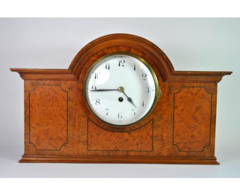 A large 1920's inlaid striking mantle clock, H. 30cm.