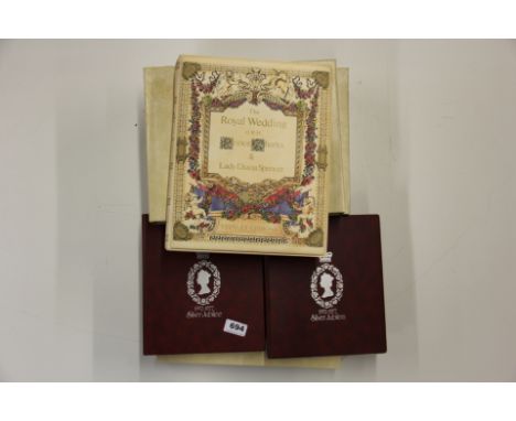 Four albums of British Silver Jubilee stamps and first day covers.