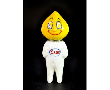 A small lighter in the form of an Esso advertising figure, H. 6cm.