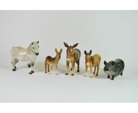 A group of five Beswick animals.