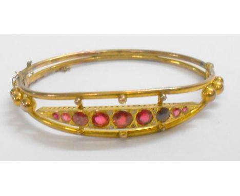 9ct Gold Hinged Bangle with safety chain, inset with white & red stones 